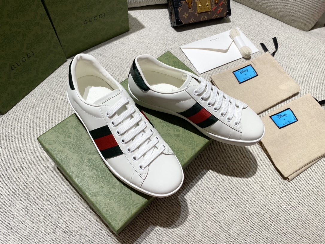 G*u*i sneakers