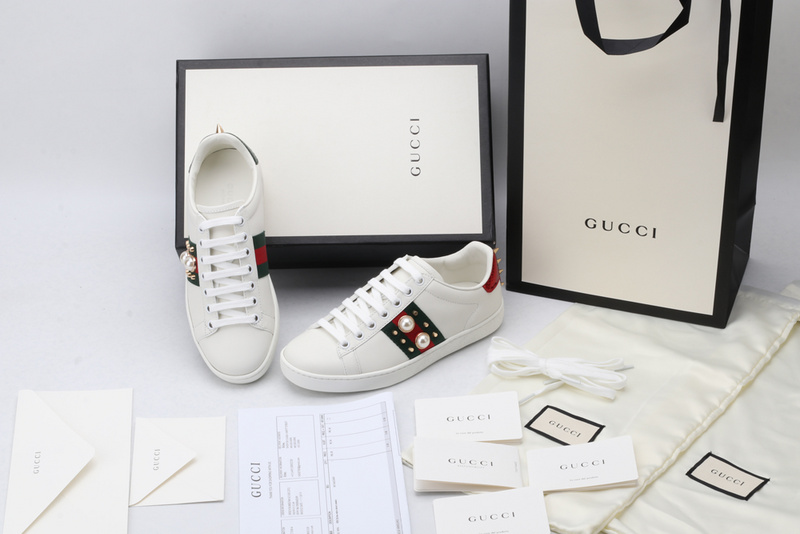 G*u*i sneakers