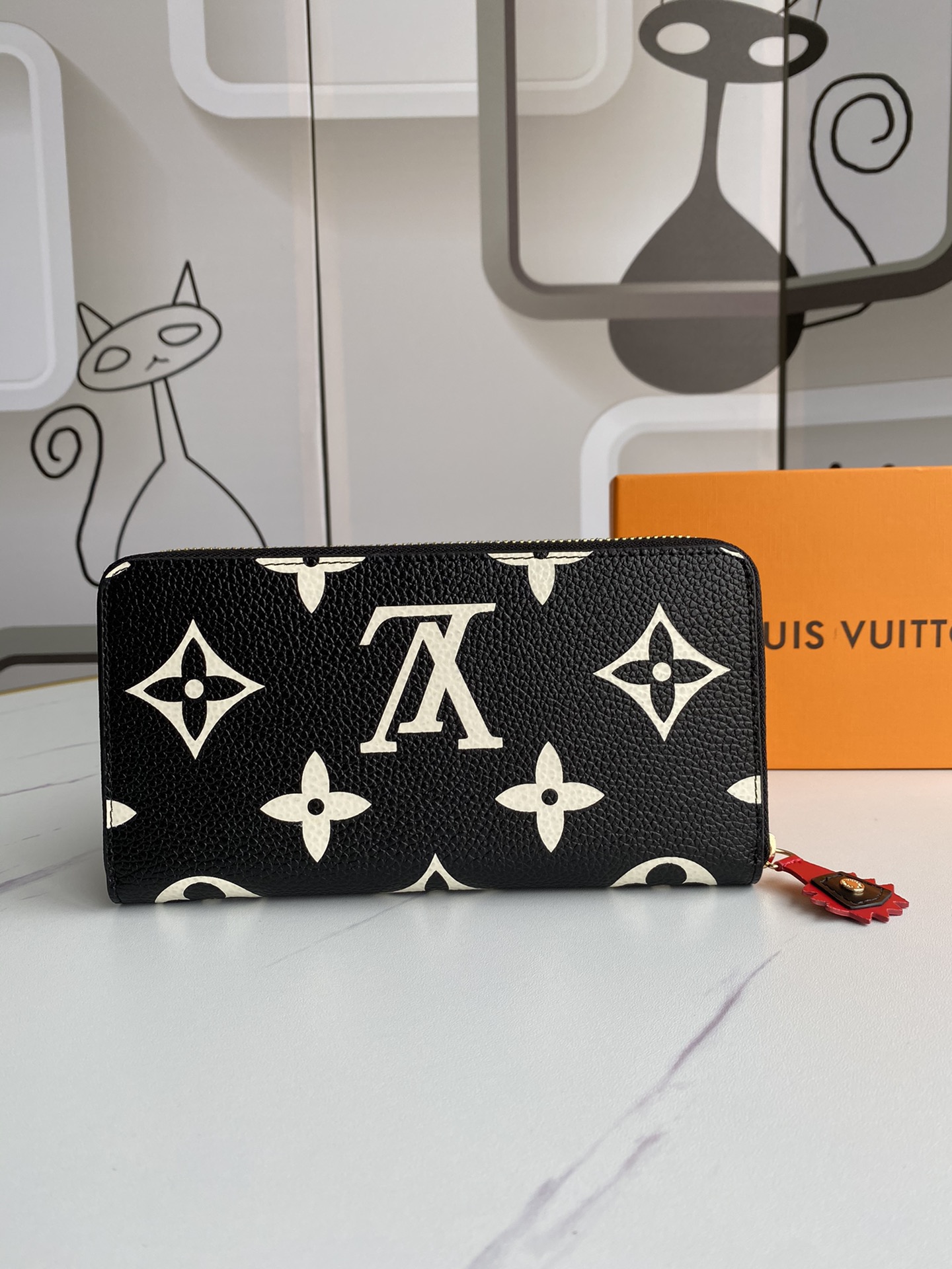L0vis Vvtt0n Monogram Empreinte Zippy Wallet -19*10CM