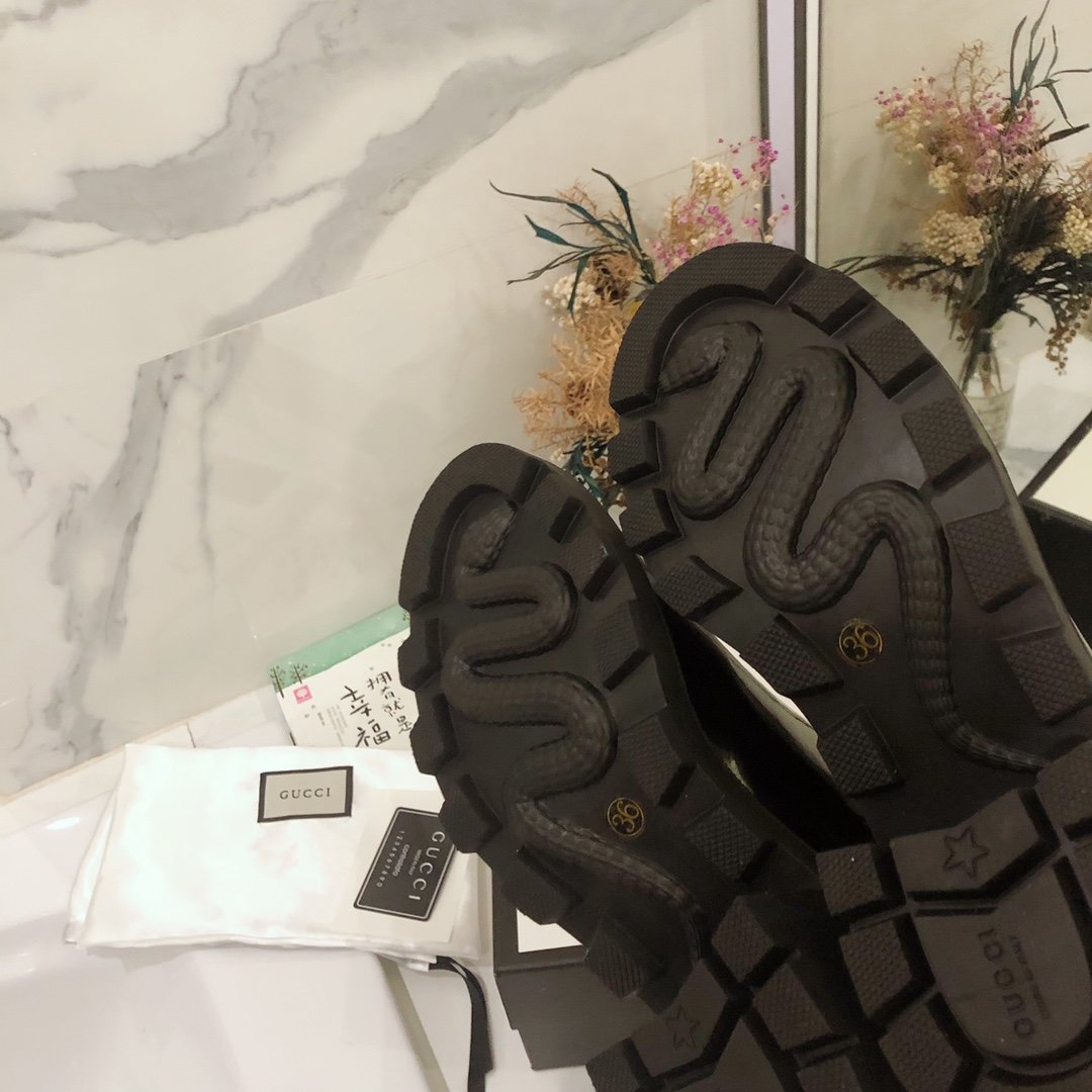 G*u*i boots