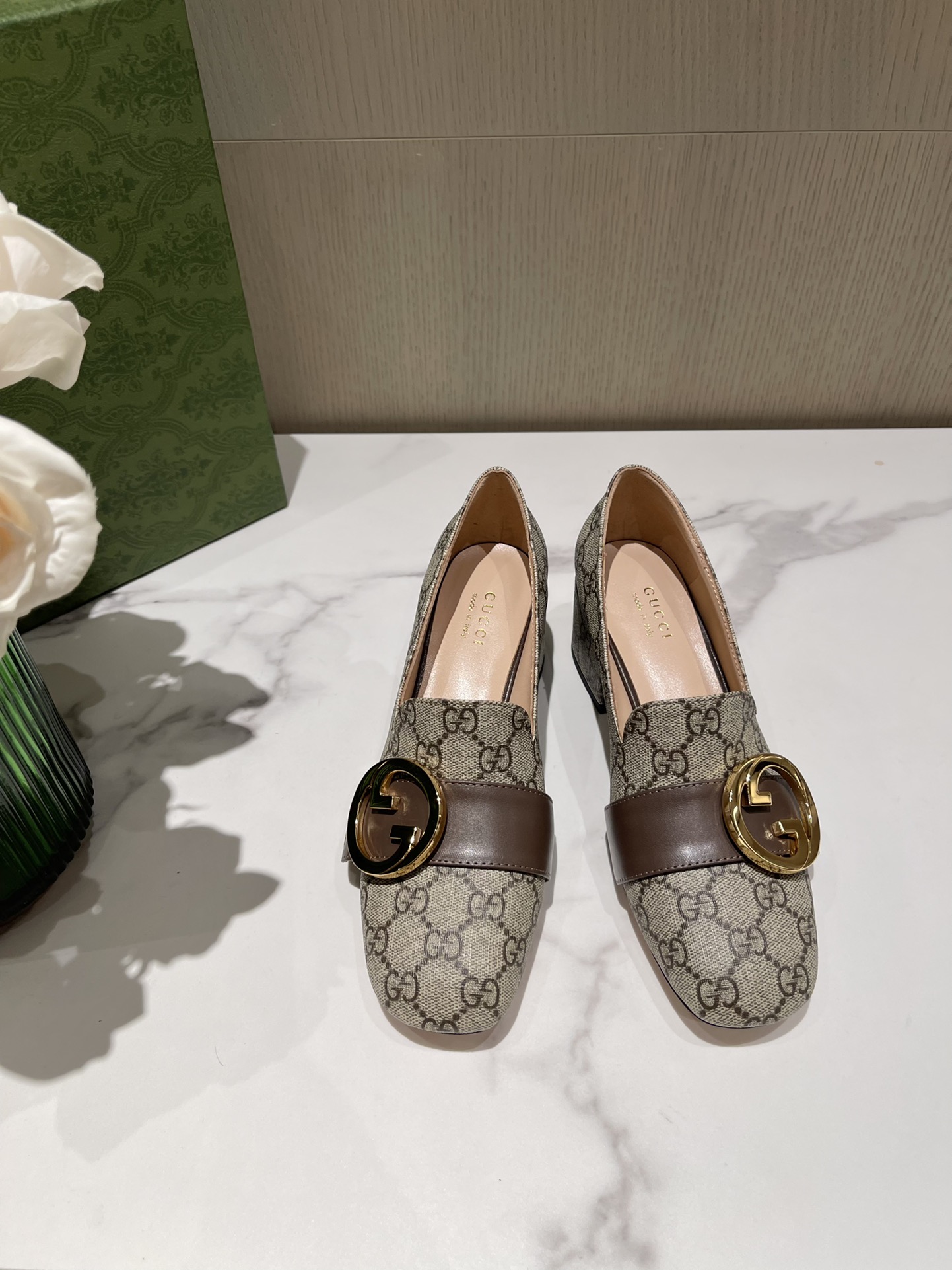 G*u*i loafers