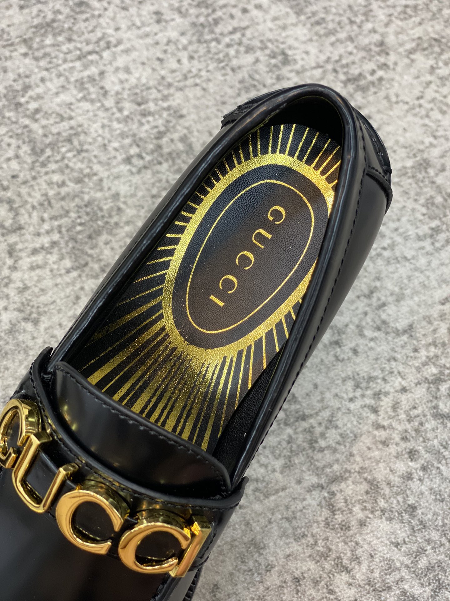 G*u*i loafers