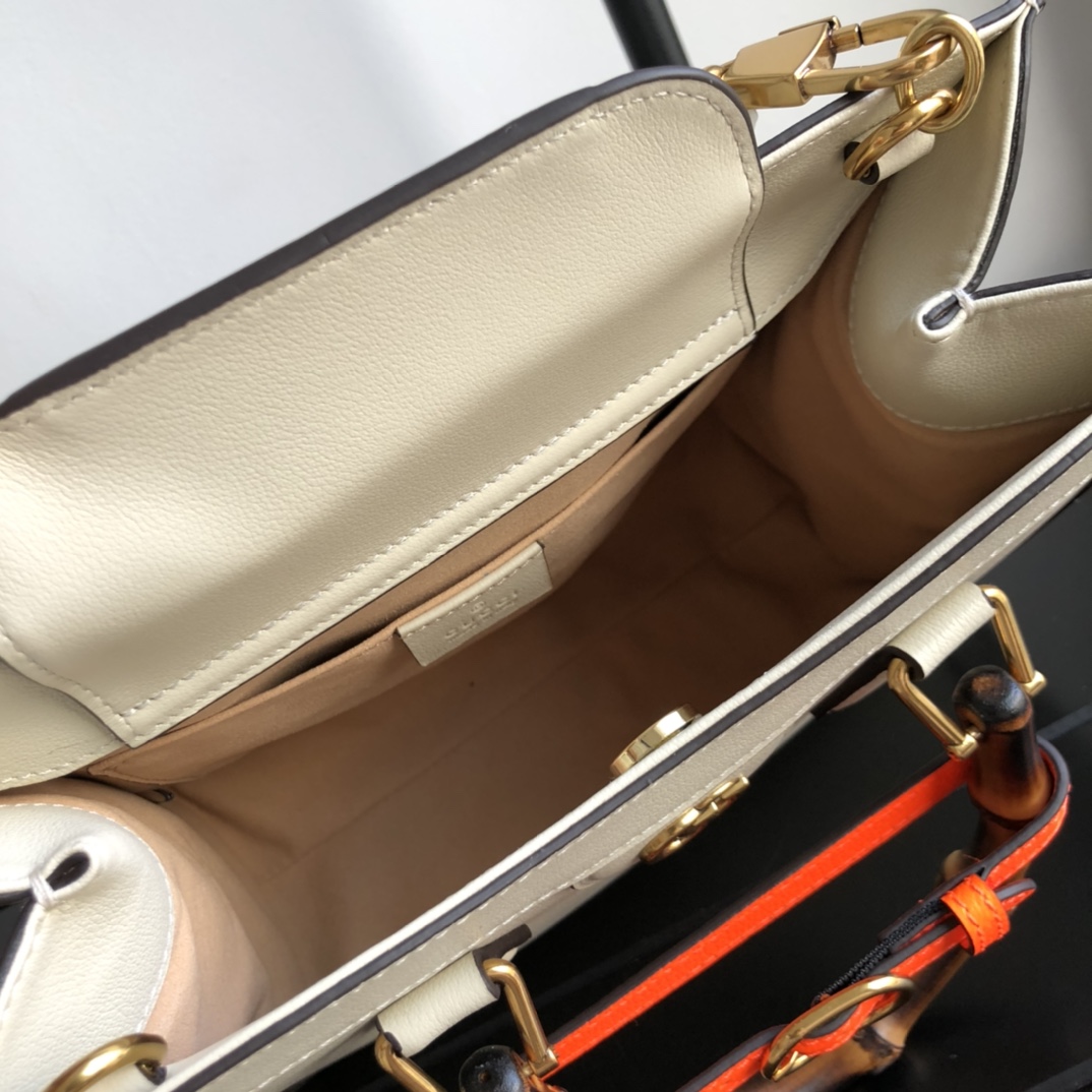 G*u*i diana top handbags