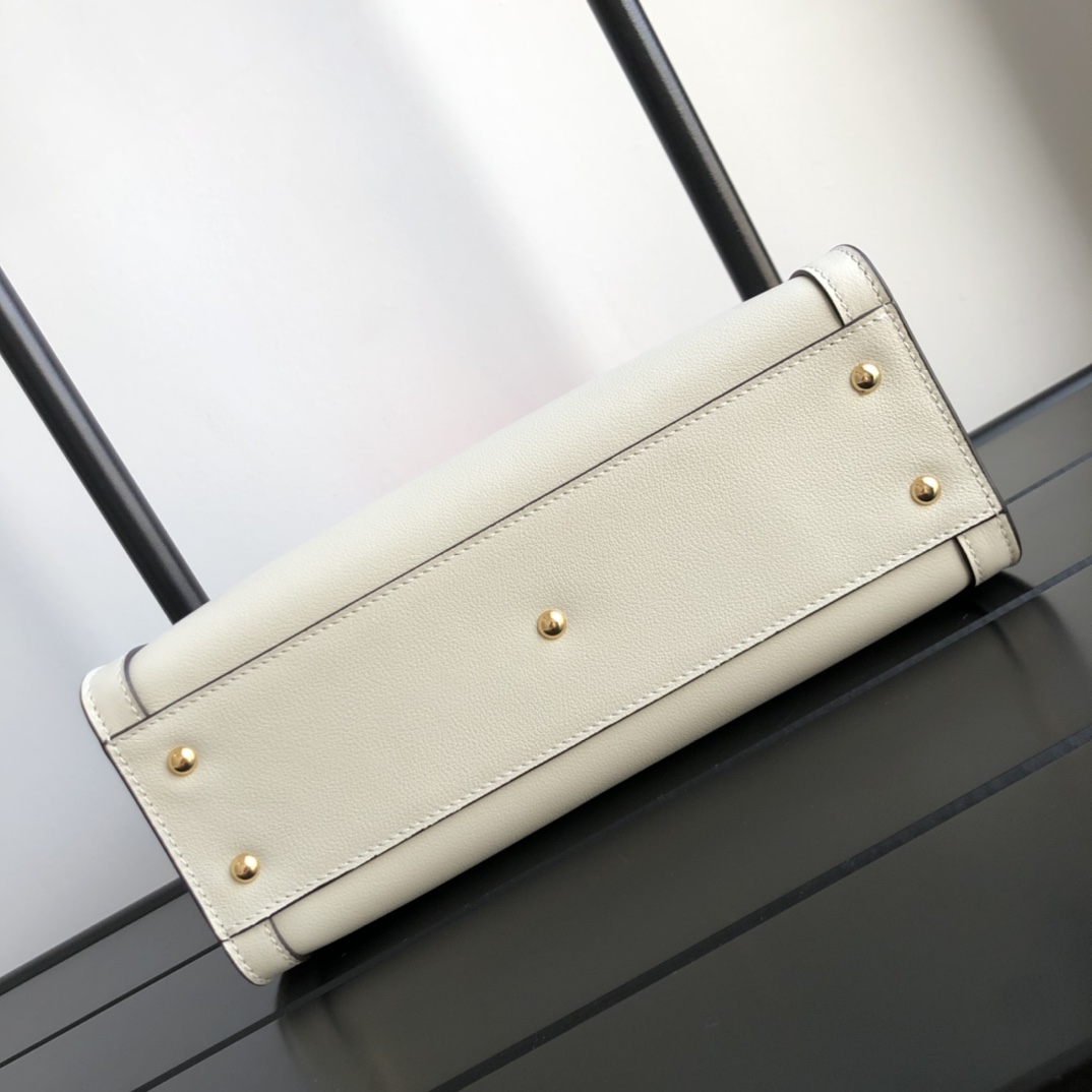 G*u*i diana top handbags
