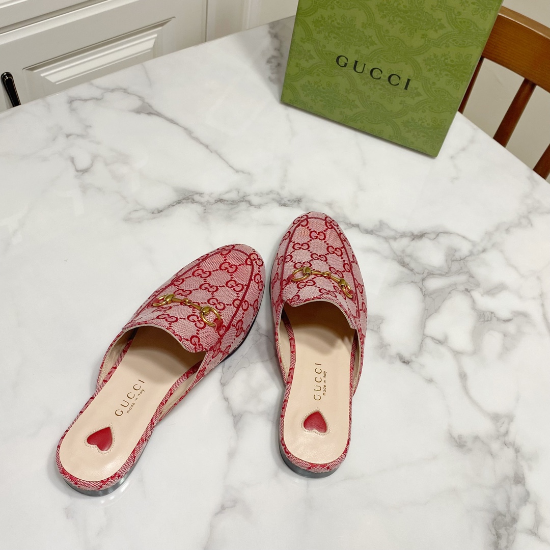 G*u*i loafers
