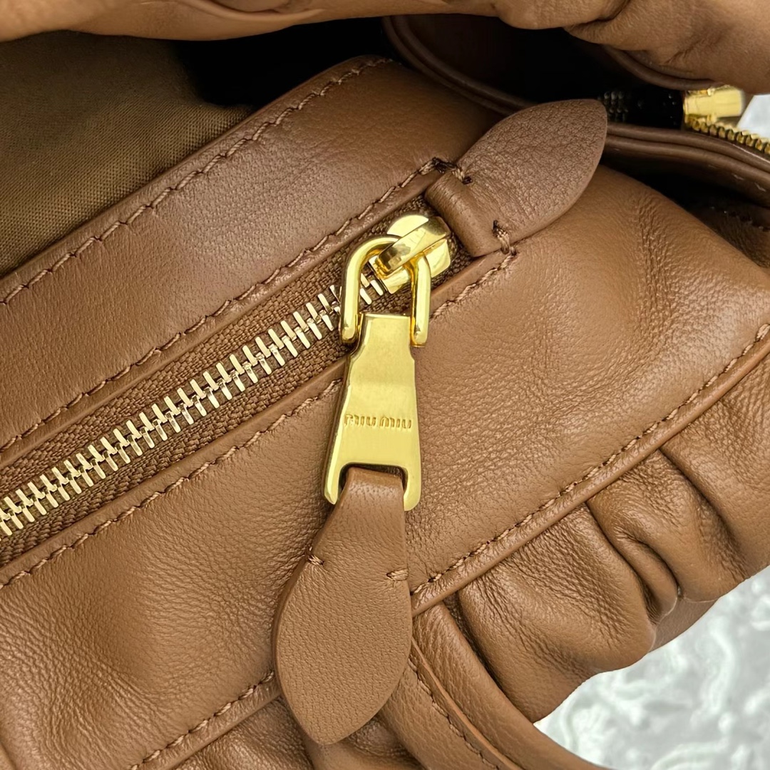 M*um*u leather hobo bag-35*18*9cm