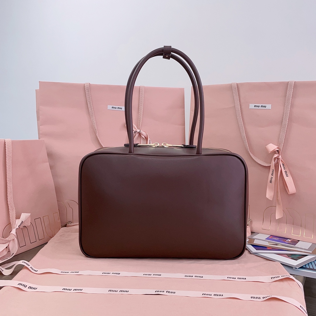 M*um*u leather top handbag-34x23x12cm