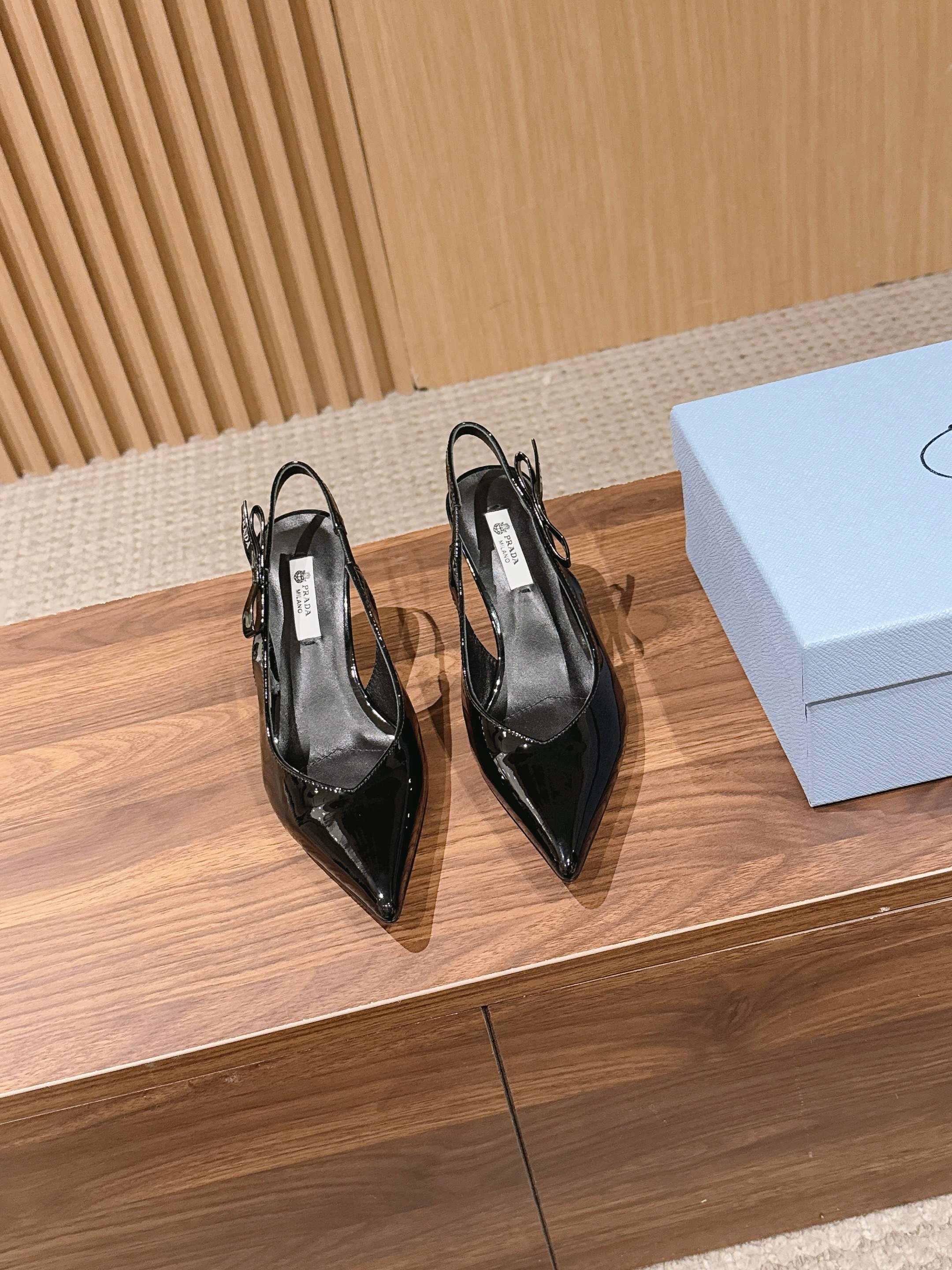 Pra*a Black Patent Leather Slingback Pumps