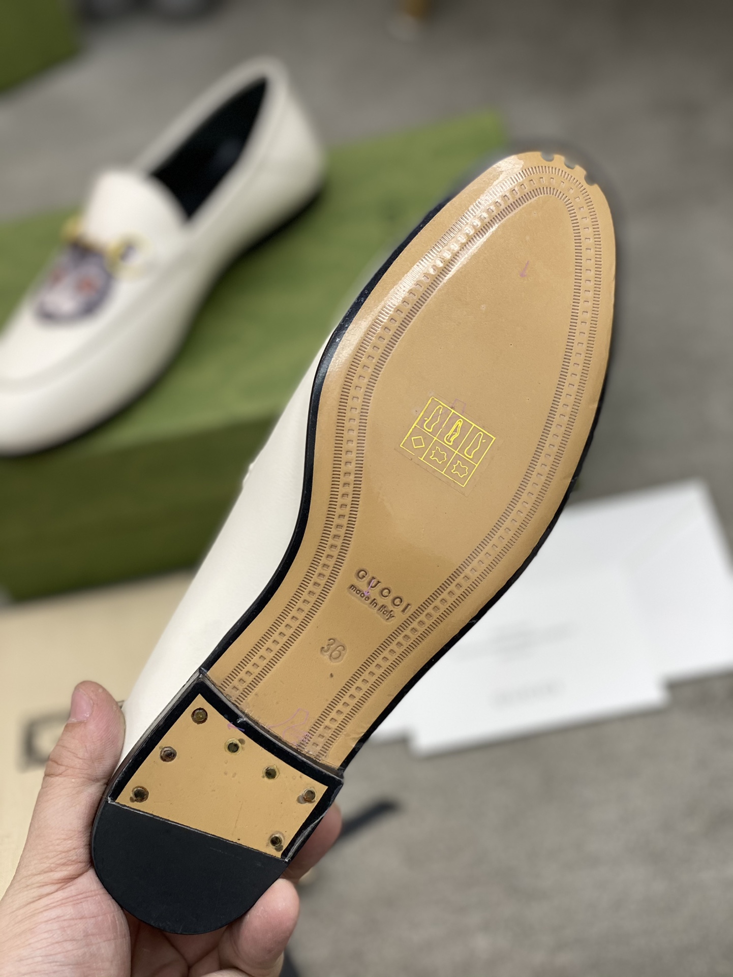 G*u*i loafers